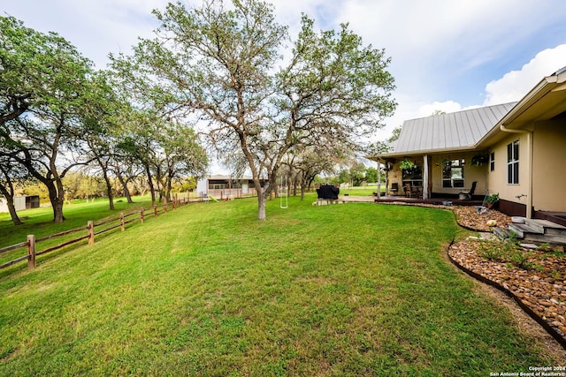 view of yard with fence