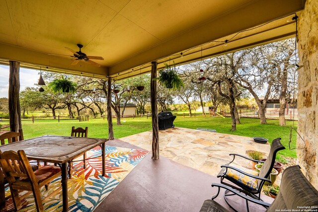 view of patio with ceiling fan