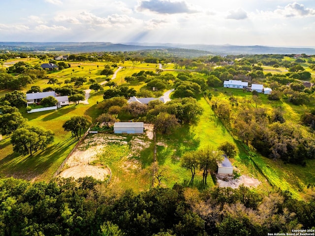 birds eye view of property featuring a rural view