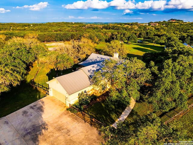 bird's eye view featuring a view of trees