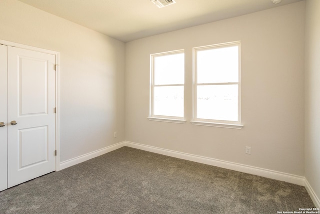 view of carpeted spare room