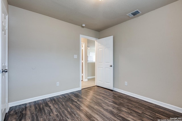 203 Carranza St, San Antonio, TX 78225 - empty room with wood finished floors and baseboards