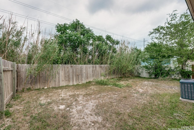 203 Carranza St, San Antonio, TX 78225 - fenced backyard featuring central air condition unit