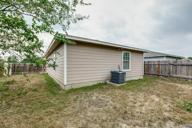 203 Carranza St, San Antonio, TX 78225 - back of house featuring central AC