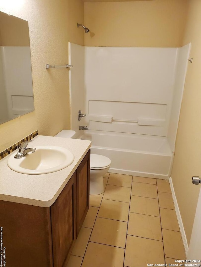 full bathroom featuring bathtub / shower combination, toilet, and vanity