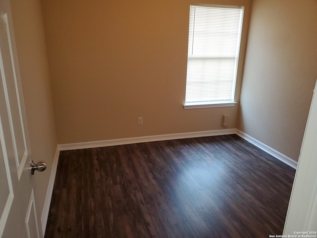 empty room featuring hardwood / wood-style floors