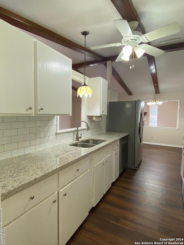 kitchen with dishwasher, pendant lighting, beam ceiling, white cabinetry, and sink