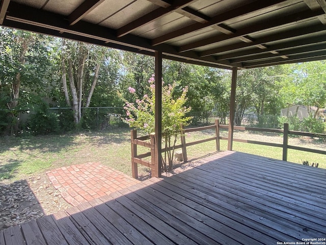 deck featuring a lawn