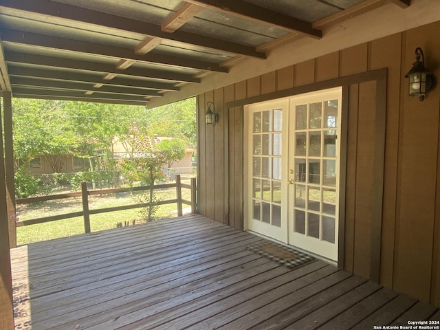 wooden terrace featuring french doors