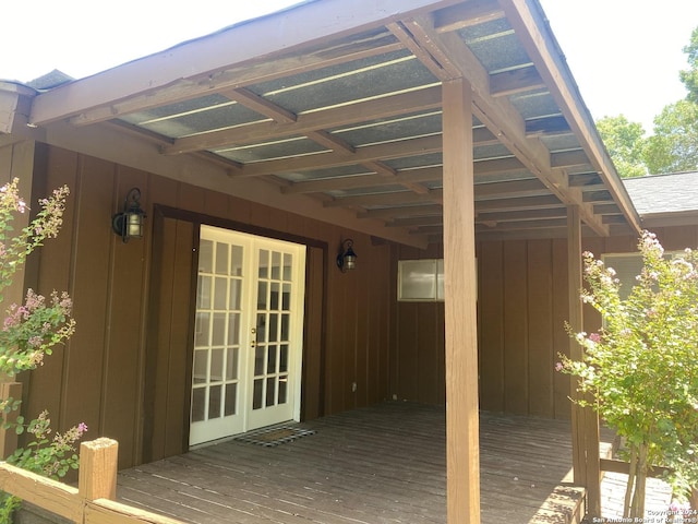 wooden deck featuring french doors