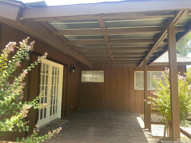 view of patio / terrace featuring french doors and a wooden deck