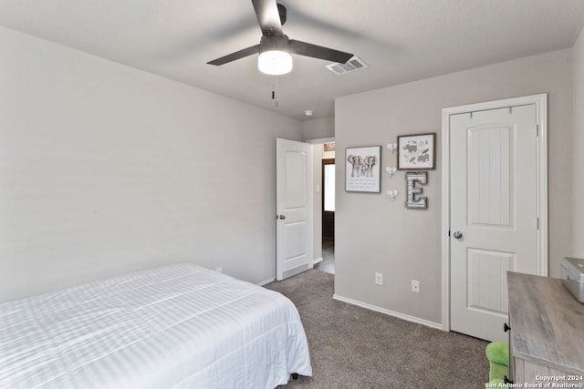 carpeted bedroom featuring ceiling fan