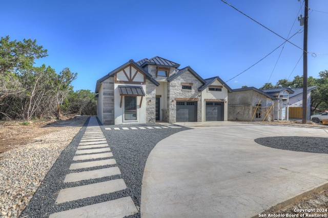 view of front of home with a garage