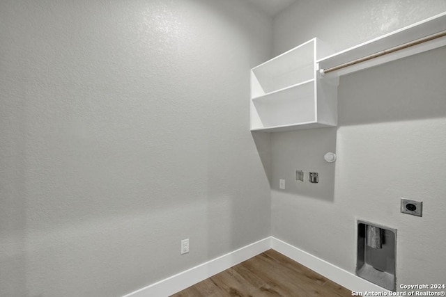 laundry area with wood-type flooring and electric dryer hookup