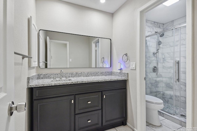 14343 Judson Rd Unit 803, San Antonio, TX 78233 - full bathroom featuring vanity, toilet, a shower stall, and tile patterned flooring