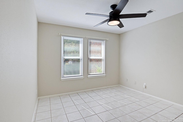 14343 Judson Rd Unit 803, San Antonio, TX 78233 - empty room with a ceiling fan, light tile patterned flooring, and baseboards