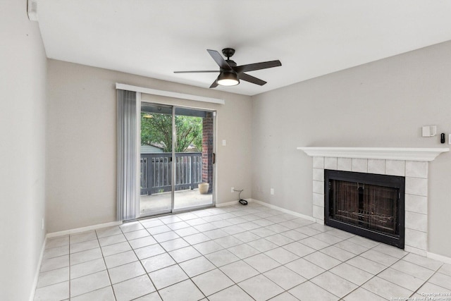 14343 Judson Rd Unit 803, San Antonio, TX 78233 - unfurnished living room with ceiling fan, a fireplace, baseboards, and light tile patterned floors