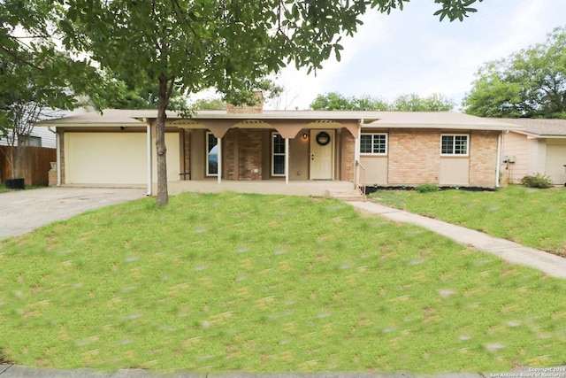 single story home with a garage and a front yard