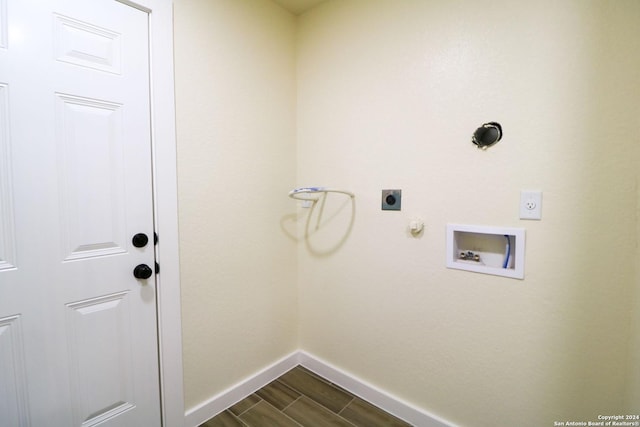 clothes washing area featuring hookup for a washing machine, gas dryer hookup, and electric dryer hookup