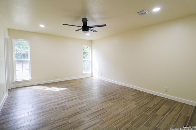 spare room featuring ceiling fan