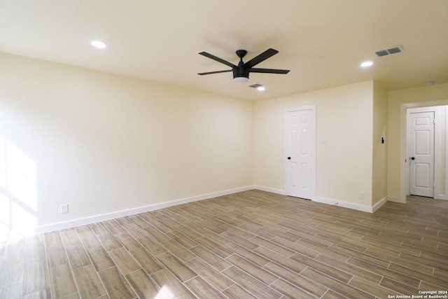 spare room with ceiling fan