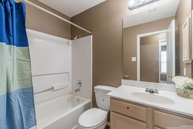 full bathroom with toilet, vanity, and shower / tub combo with curtain