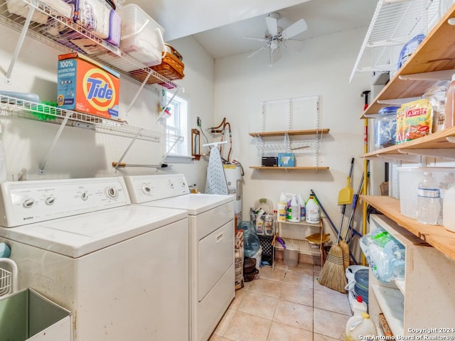 laundry area featuring a ceiling fan, laundry area, washing machine and clothes dryer, and light tile patterned floors