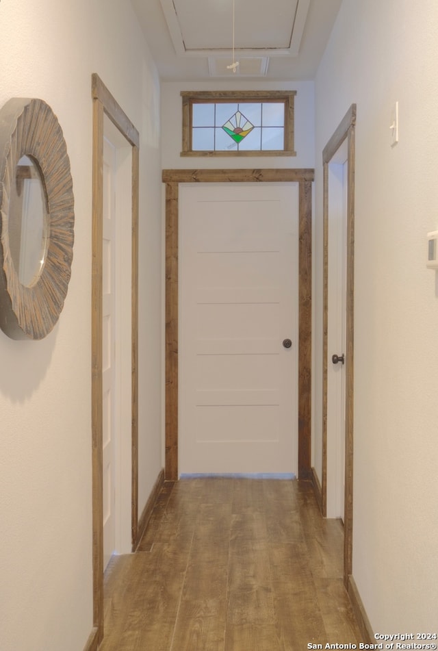 corridor featuring light hardwood / wood-style flooring