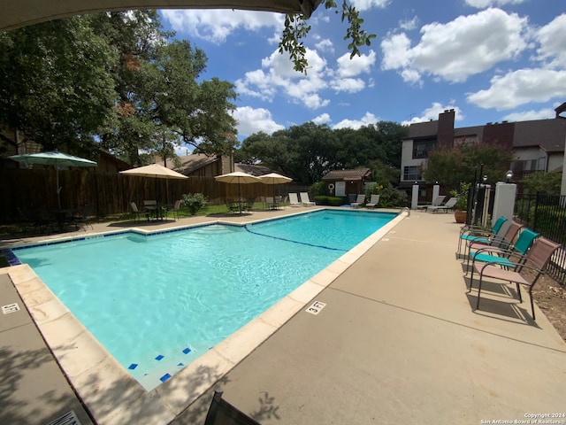 view of pool featuring a patio area