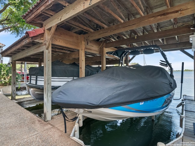 dock area featuring a water view