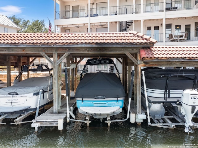 dock area with a water view