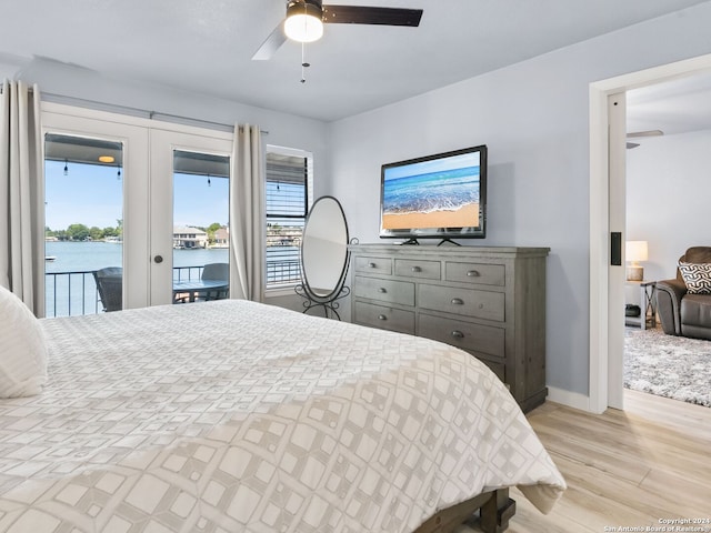 bedroom with french doors, ceiling fan, access to exterior, and light wood-type flooring