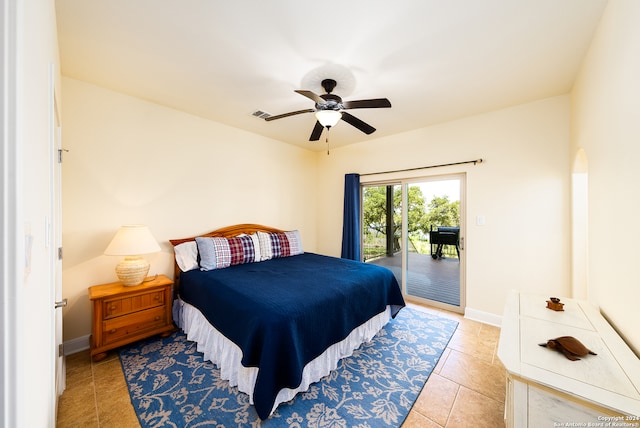 bedroom featuring ceiling fan, light tile patterned floors, and access to outside