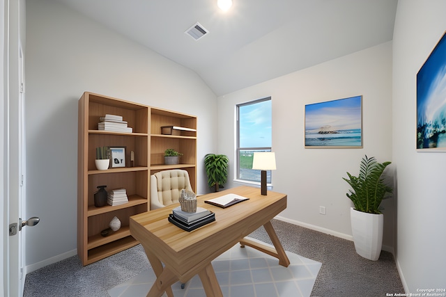 office featuring lofted ceiling and carpet floors