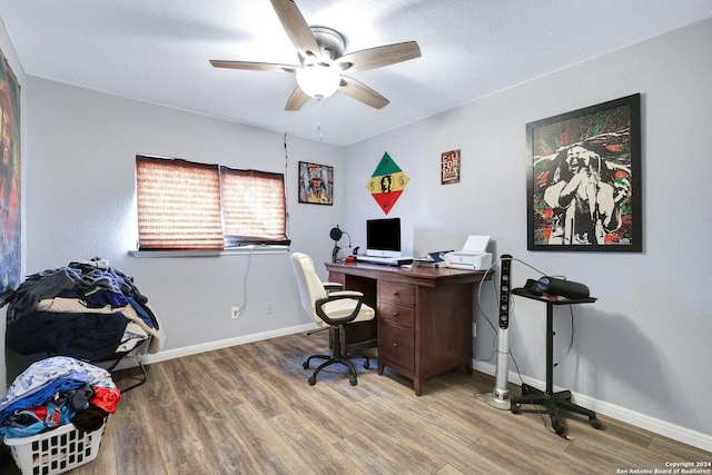 office space featuring ceiling fan and wood-type flooring