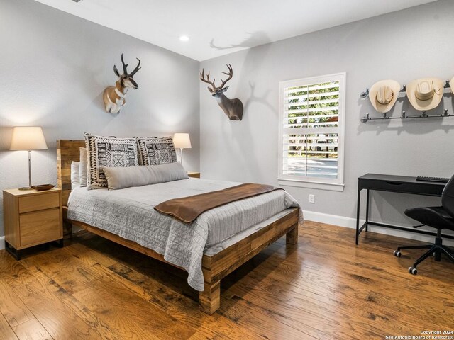 5 Old Fredericksburg, Boerne, TX 78015 - bedroom featuring baseboards, recessed lighting, and wood finished floors