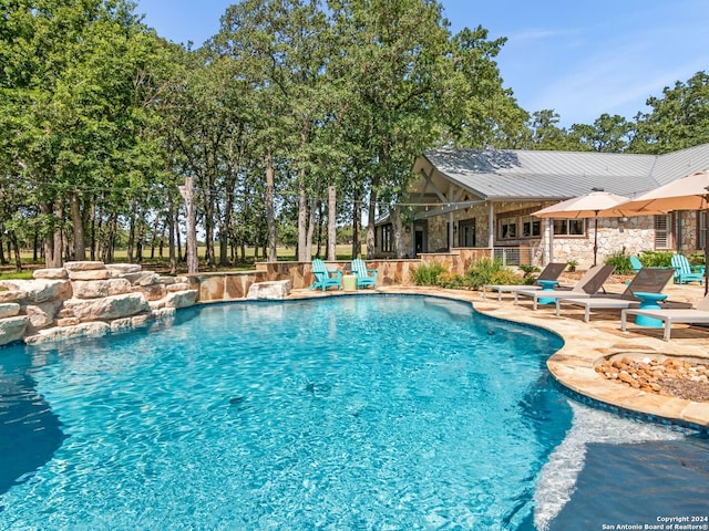 view of pool with a patio