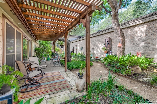 view of patio featuring a pergola