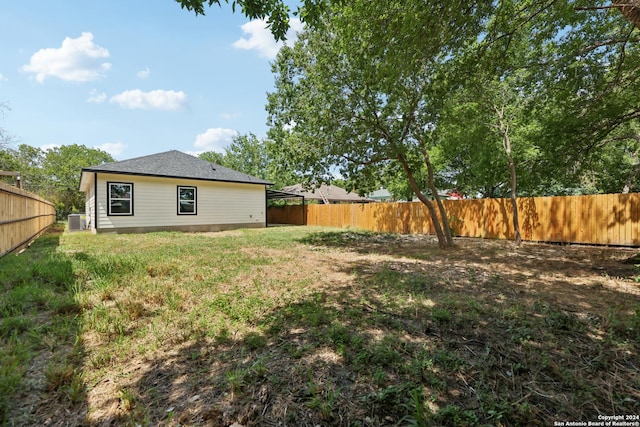 1342 E Chavaneaux Rd, San Antonio, TX 78214 - fenced backyard with central air condition unit