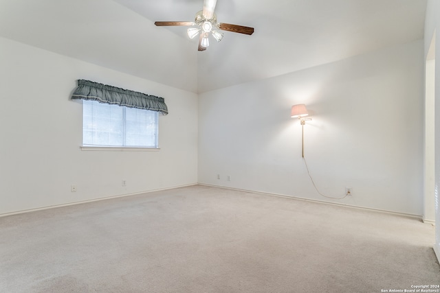 empty room with light colored carpet and ceiling fan