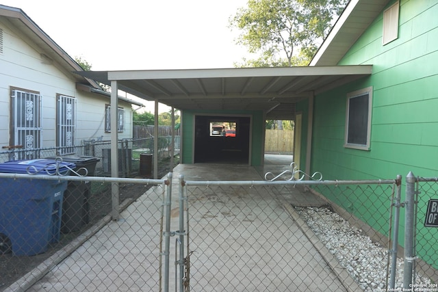 view of side of property featuring a carport