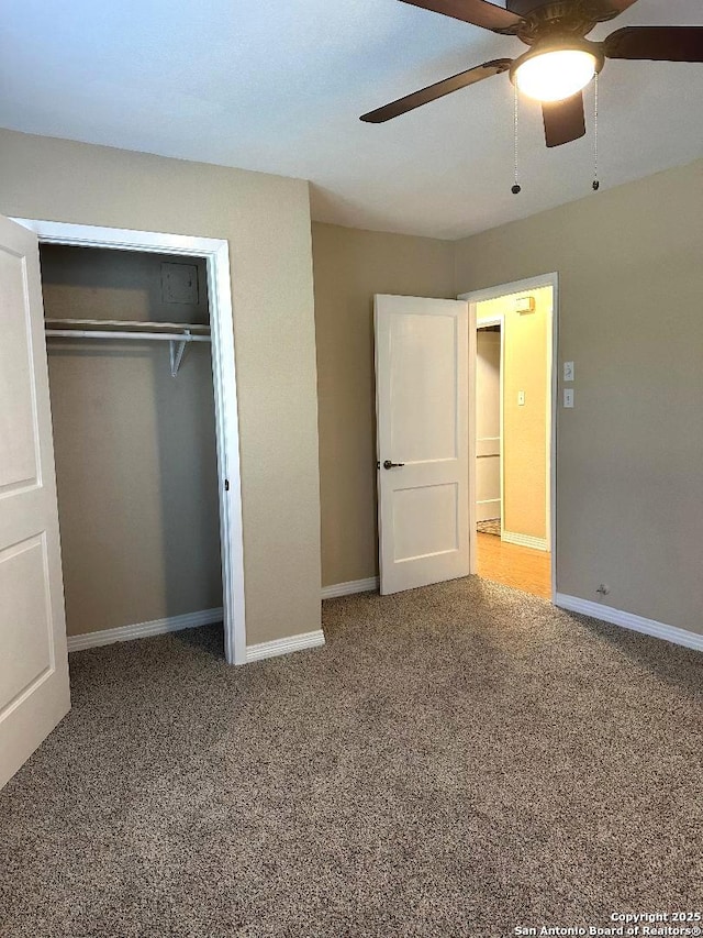 411 W Hart Ave, San Antonio, TX 78214 - unfurnished bedroom featuring carpet flooring, a closet, baseboards, and ceiling fan