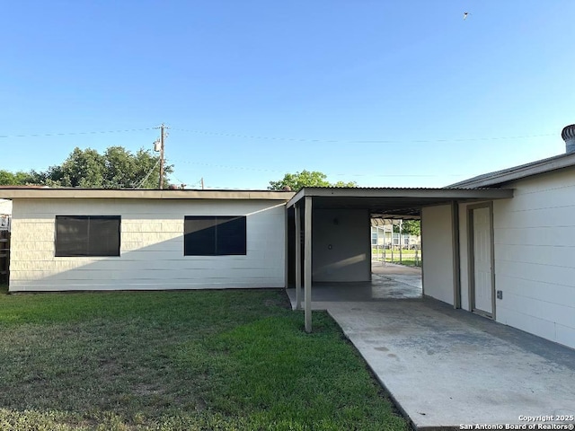 411 W Hart Ave, San Antonio, TX 78214 - exterior space featuring a yard and an attached carport