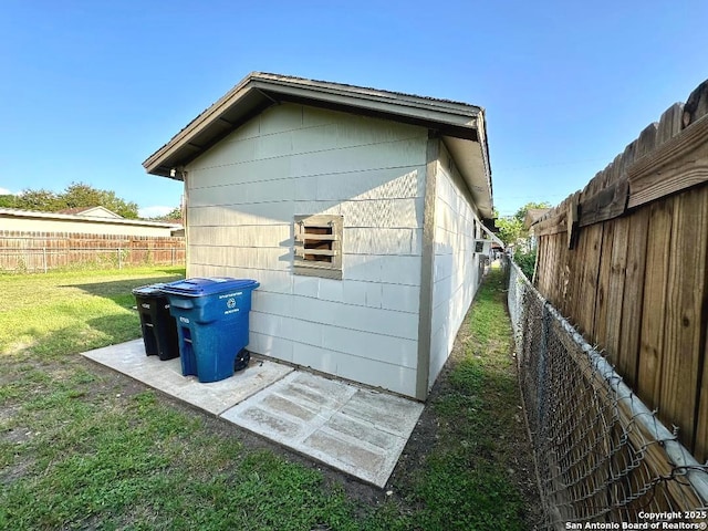 411 W Hart Ave, San Antonio, TX 78214 - view of side of property featuring a yard and a fenced backyard