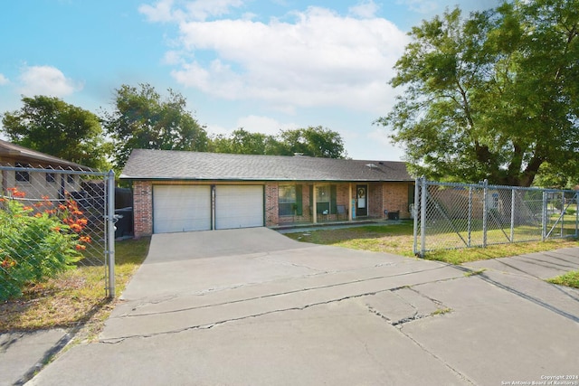 view of front of home featuring a garage and a front lawn