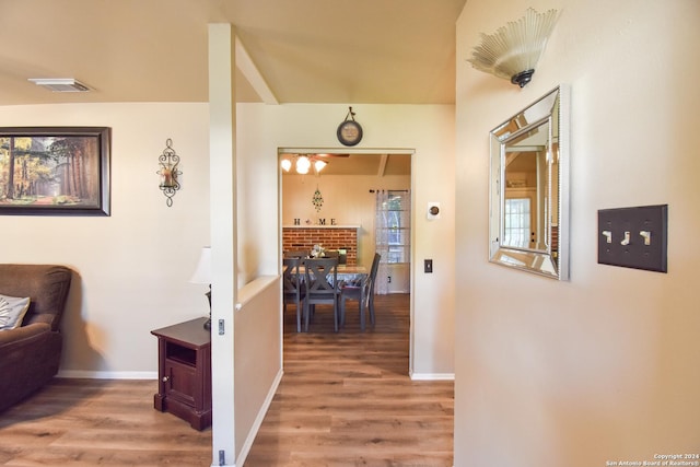 hallway featuring hardwood / wood-style floors