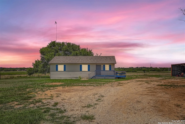 view of front of house featuring a wooden deck