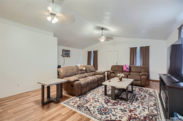 living room featuring light hardwood / wood-style flooring and ceiling fan