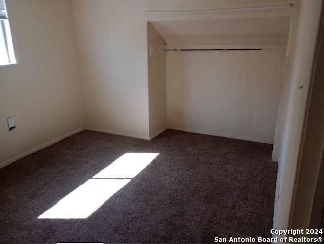 empty room featuring carpet floors