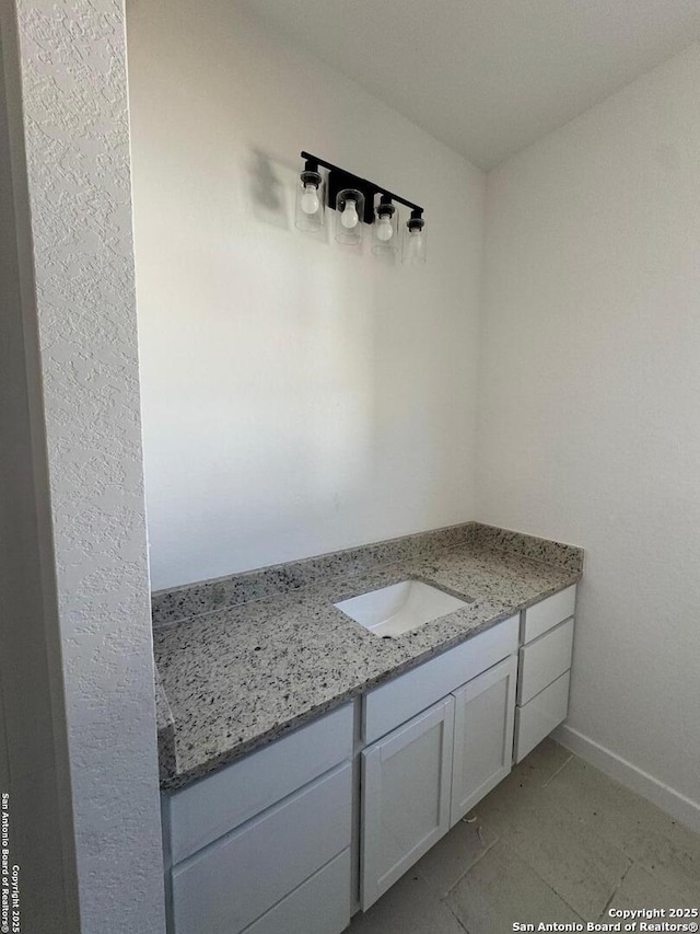 bathroom featuring vanity and tile patterned floors